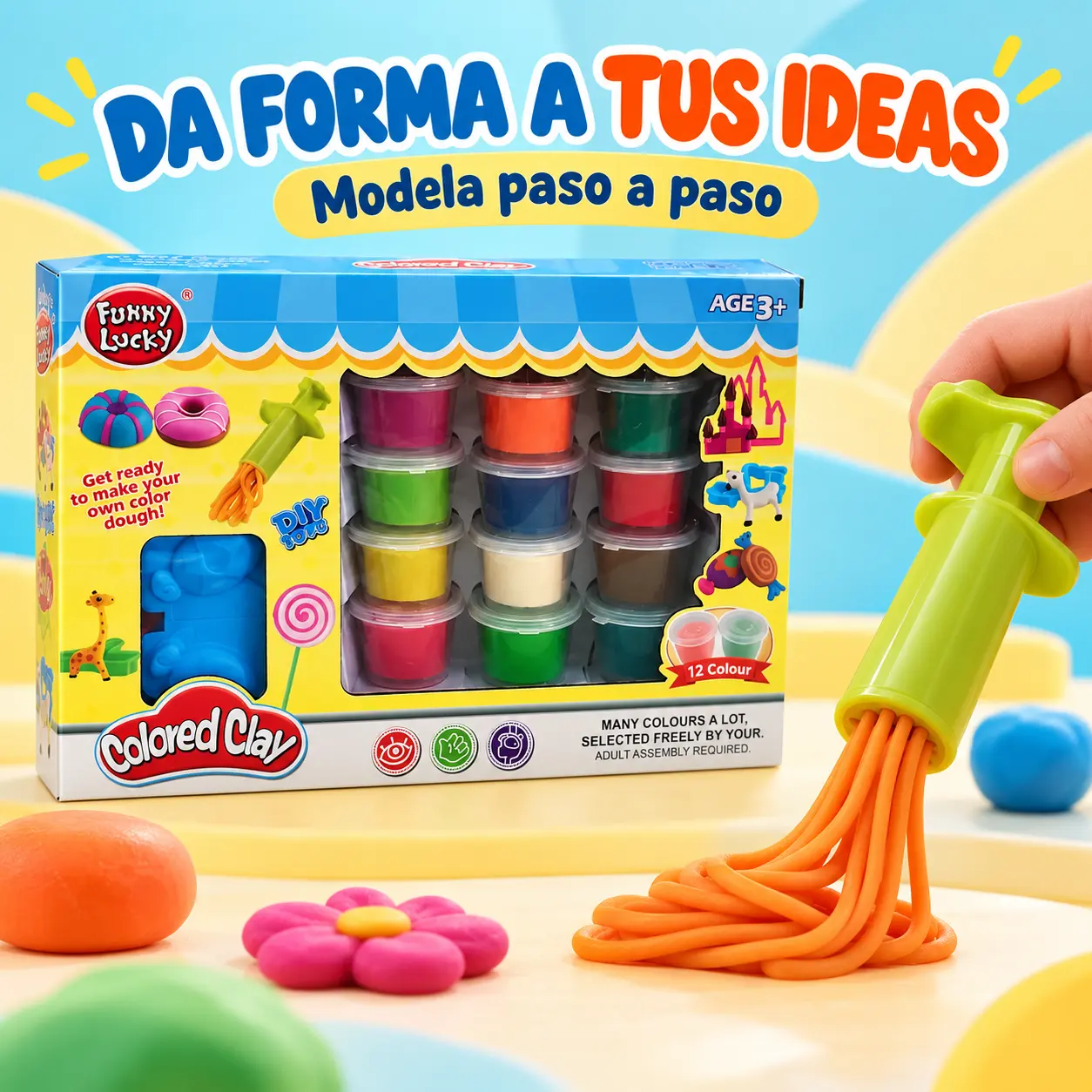 Extrusor verde formando tiras de masa naranja junto al set de colores – JUG.TIM.F018-143